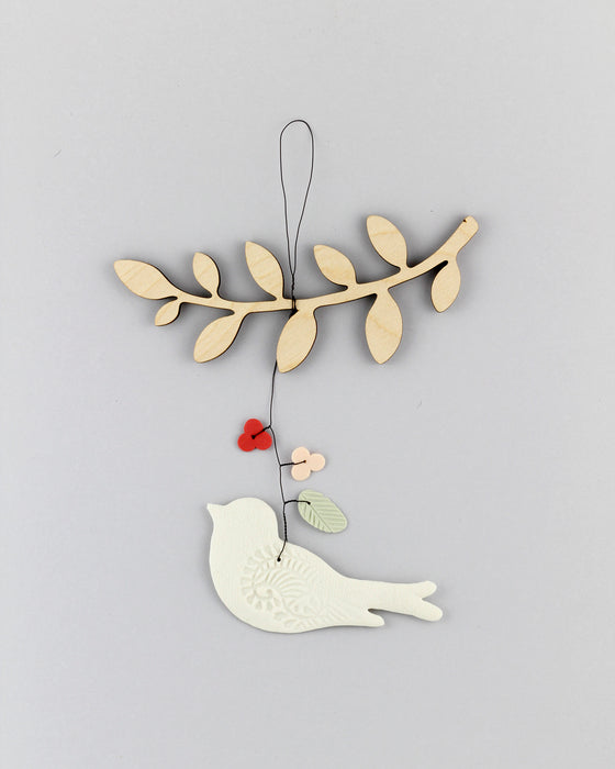 Decorazione in porcellana e legno "Rametto" con uccellino e fiori (fine serie)