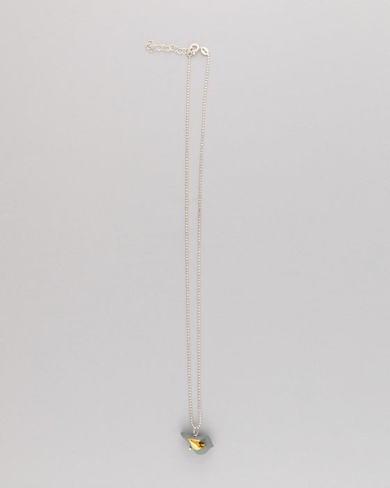 Collana in argento con uccellino grigio e oro