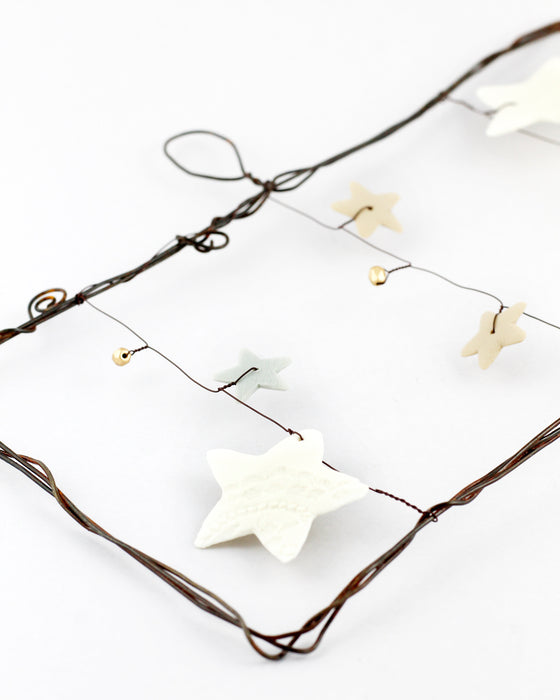 Decorazione in porcellana e ferro "Rettangolo orizzontale" con stelle (L)