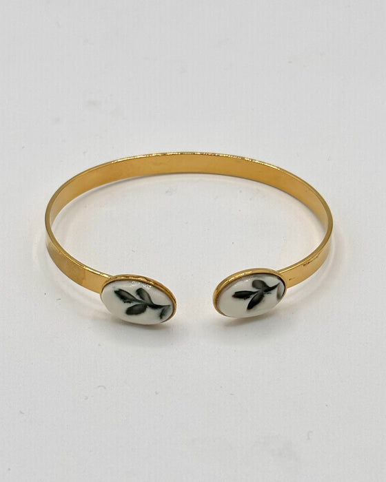 Bracciale rigido in ottone e porcellana