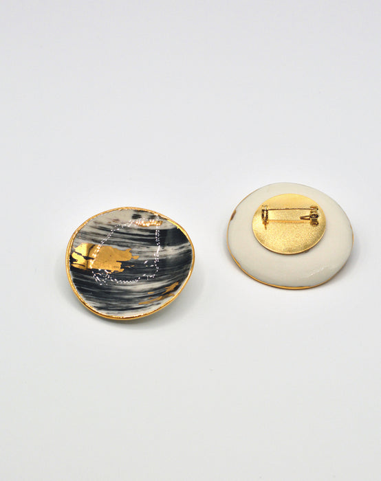 Spille in porcellana “Pennellata” in lustro oro