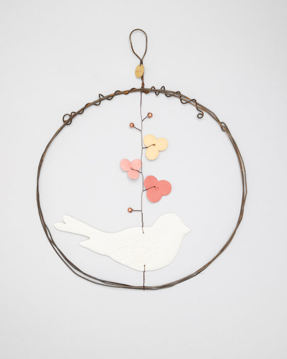 Decorazione in porcellana e ferro "Cerchio" con uccellino (L)