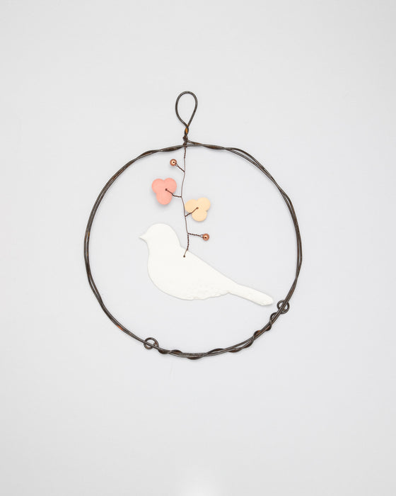 Decorazione in porcellana e ferro "Cerchio" con uccellino (M)
