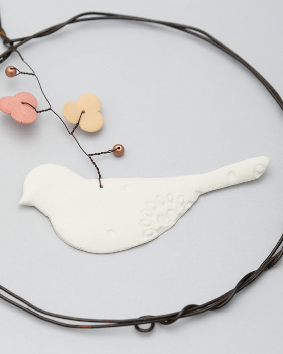 Decorazione in porcellana e ferro "Cerchio" con uccellino (M)