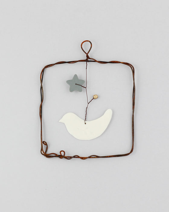 Decorazione in porcellana e ferro "Quadrato" con uccellino (S)